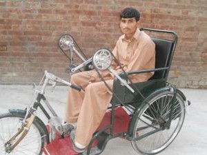 SHAHID IS HAPPY WITH HIS TRICYCLE DONATED BY SPIRIT